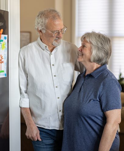 Older couple looking at each other smiling